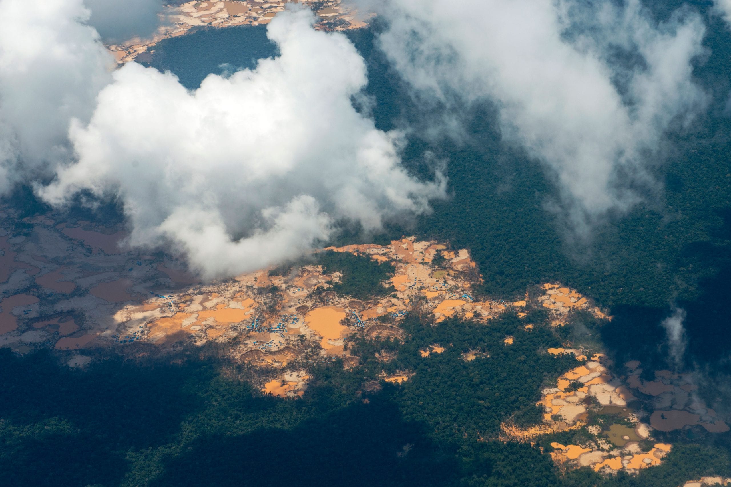 Aerial shot of small-scale gold mines in the Peruvian Amazon