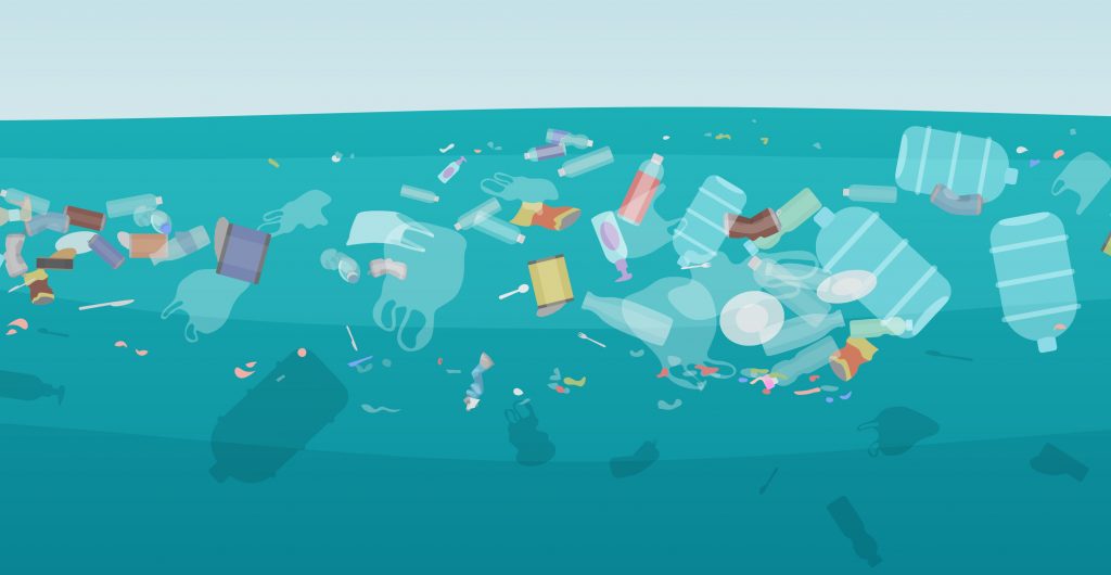 Plastic pollution like bottles and bags floating under the surface in the sea