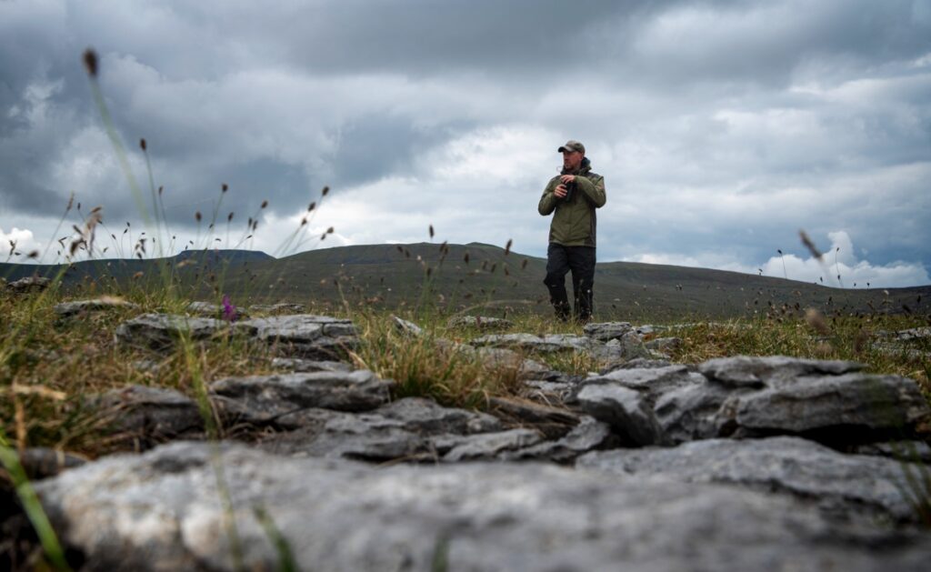 Jono Leadley of the Yorkshire Wildlife Trust stands in Wild Ingleborough National Park