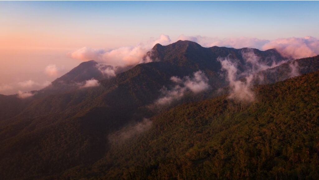 Aerial photograph of clouds and mountains in the Sierra Nevada de Santa Marta National Park in Colombia