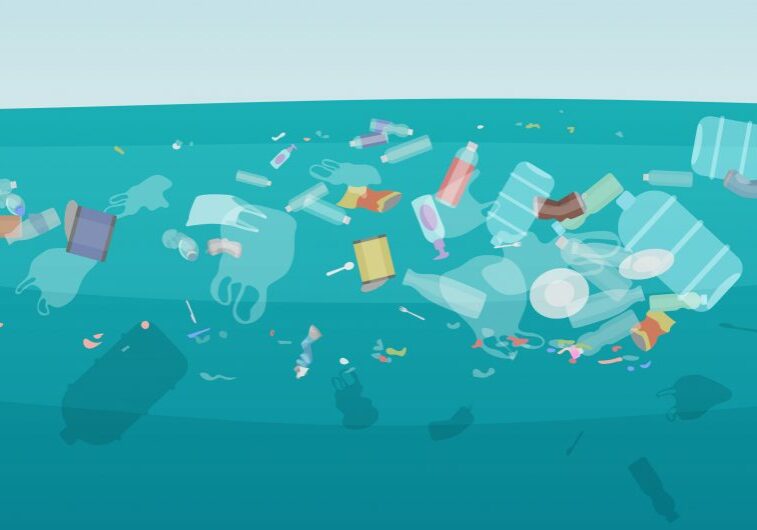 Plastic pollution like bottles and bags floating under the surface in the sea